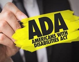 Image of someone highlighting the words "ADA Americans with Disabilities Act"
