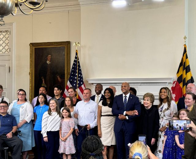 Pillars of Strength Scholarship recipients and UMGC staff members joined Governor Wes Moore and Elizabeth Dole.