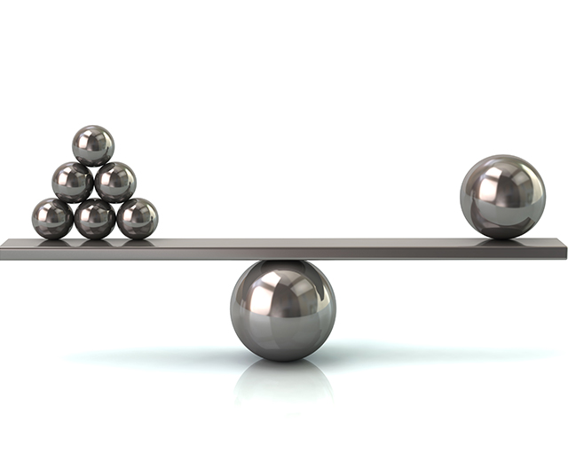 A scale balanced using silver balls.